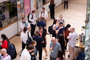 Delegates networking during the symposium