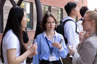 Delegates networking during the symposium