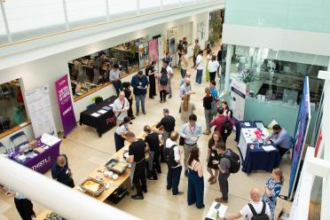 Delegates networking during the symposium