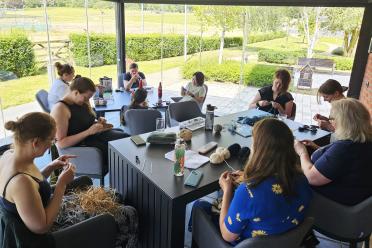 Colleagues together during a lunchtime craft club