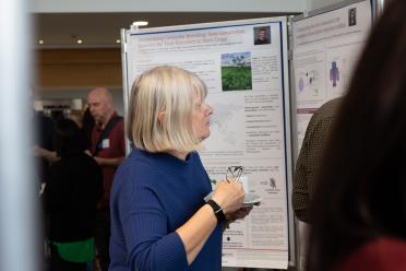 Prof Deborah Smith networking during the poster session at our Scientific Advisory Board