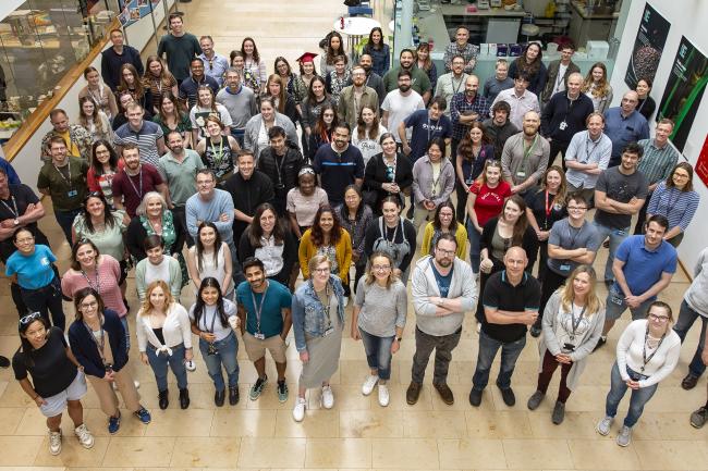 EI staff and students gathered for an all-staff group photo