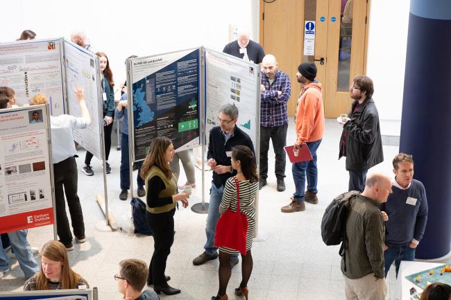 Staff networking during a poster session